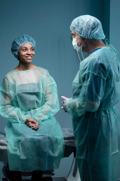 Medium shot doctor talking to patient