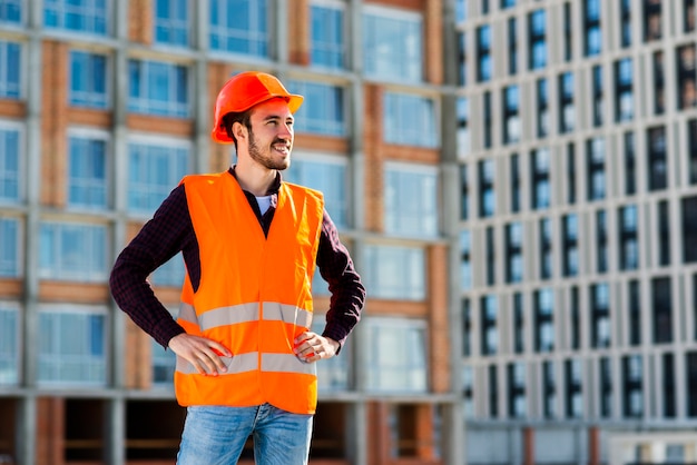 Medium shot of engineer looking away