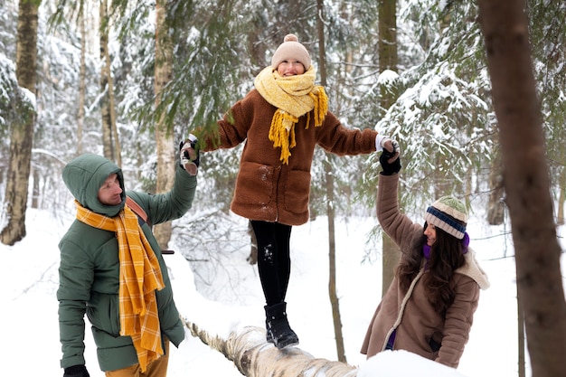 Medium shot family members in nature