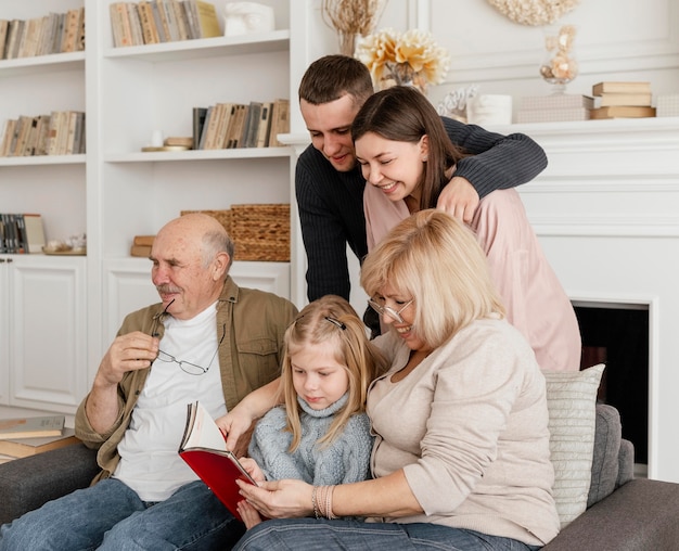 Medium shot family members reading