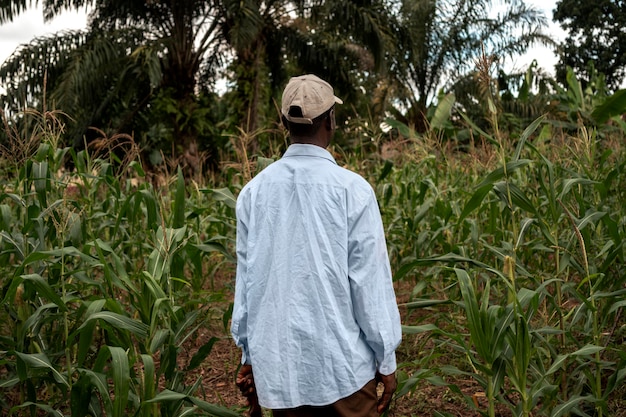 Medium shot farmer wearing hat