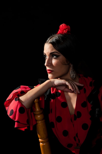 Free Photo medium shot flamenca woman looking away