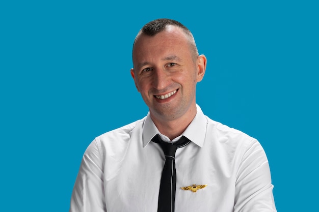 Free Photo medium shot flight attendant posing in studio