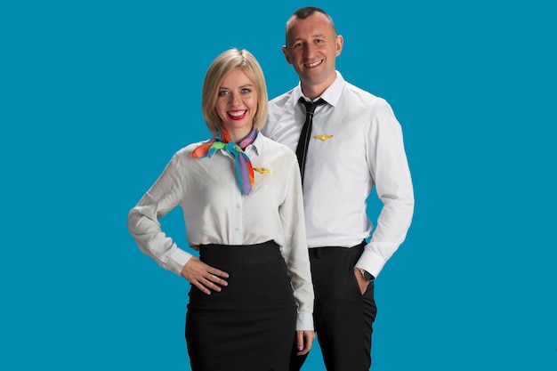 Free Photo medium shot  flight attendants posing together