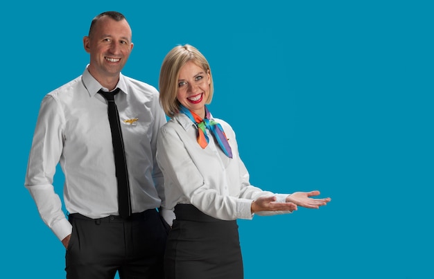 Free photo medium shot  flight attendants posing together