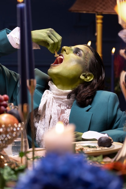 Free photo medium shot frankenstein eating