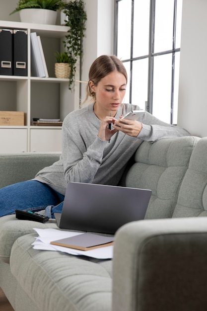 Medium shot freelancer working at home