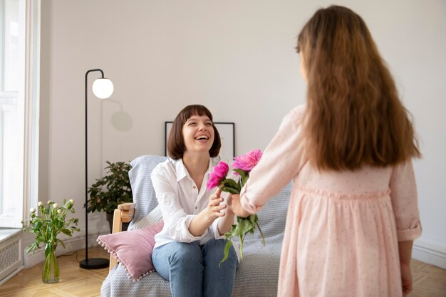 Medium shot girl offering flowers