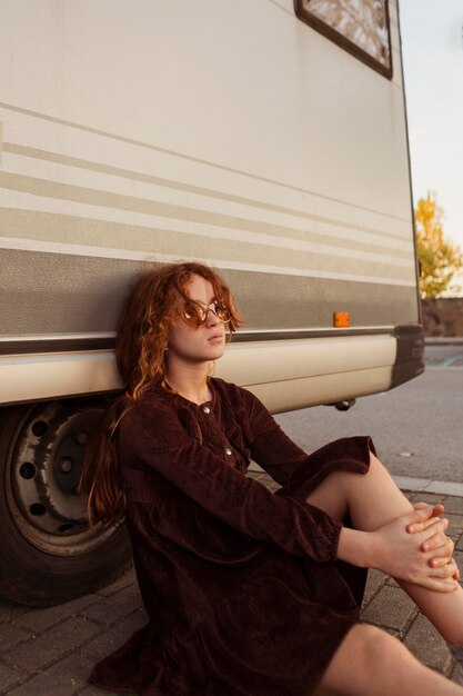 Medium shot girl posing outdoors