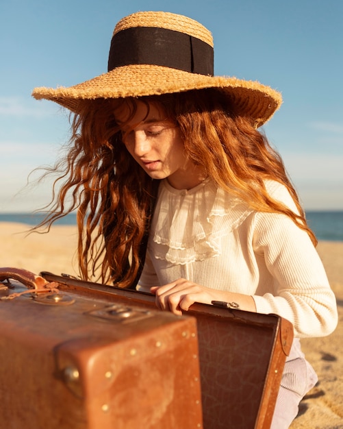 Medium shot girl wearing hat