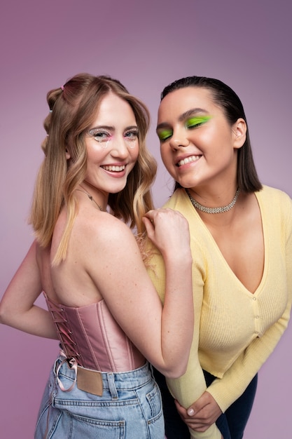 Medium shot girls posing in studio