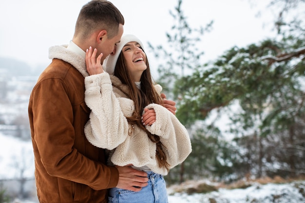 Free Photo medium shot happy couple outdoors