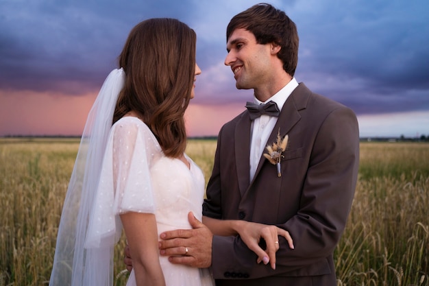 Medium shot happy couple outdoors