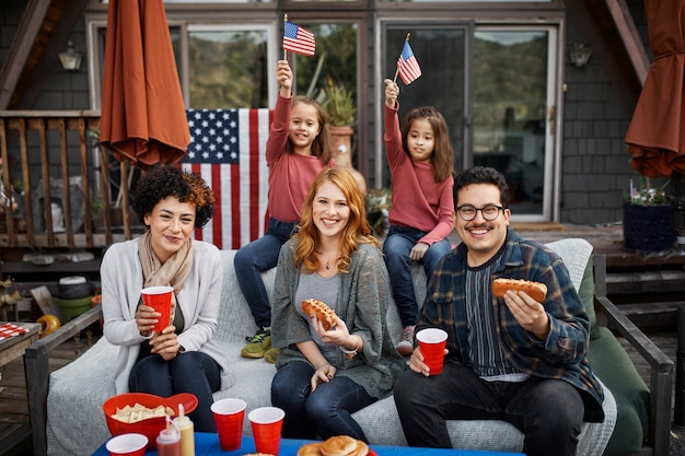 Free Photo medium shot happy family celebrating outdoors