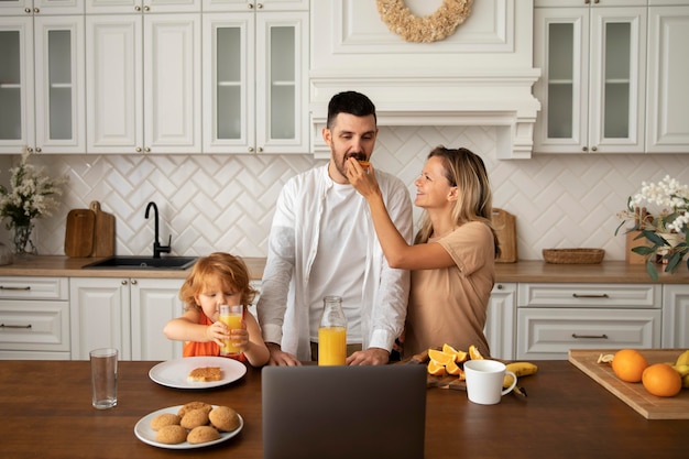 Medium shot happy family with food