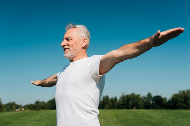 Medium shot happy man with long arms