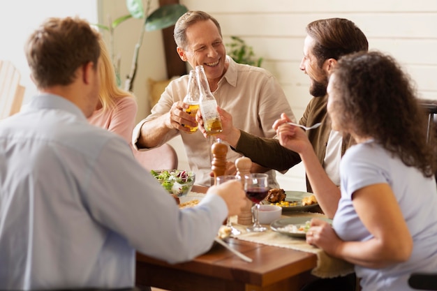 Medium shot happy people at table