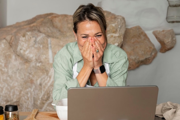 Medium shot happy woman with tablet