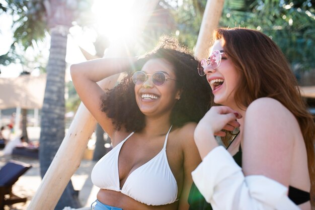 Medium shot happy women hanging out