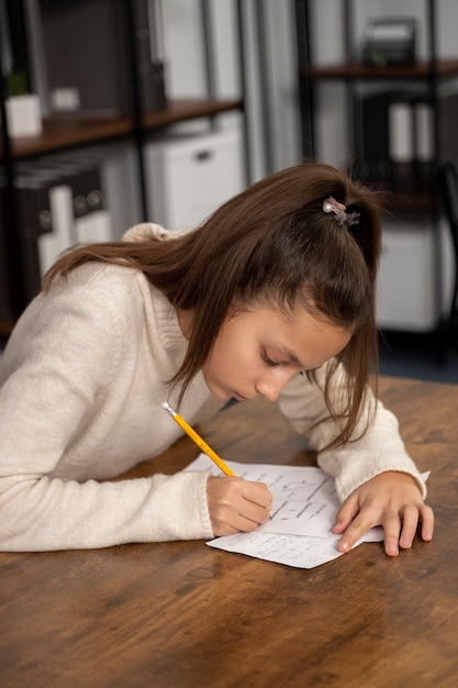 Free photo medium shot kid cheating at school test