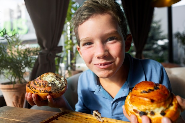 Medium shot kid eating dessert