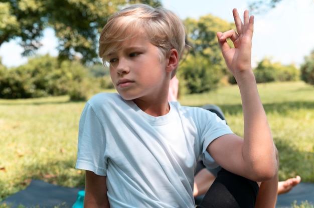 Medium shot kid outdoors