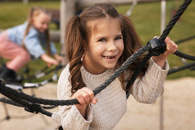 Free photo medium shot kids playing outdoors