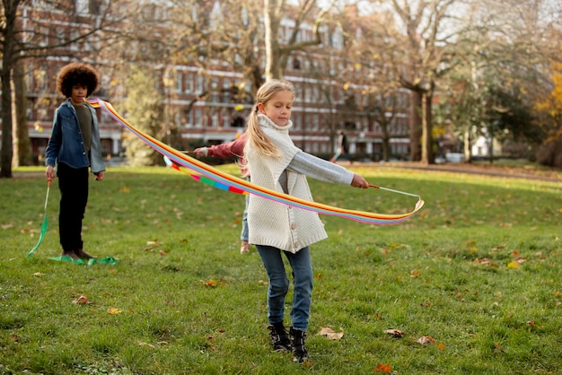 Free photo medium shot kids playing outdoors