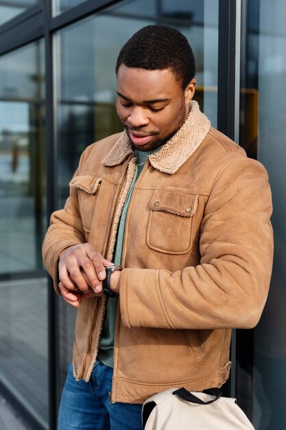 Medium shot man checking watch