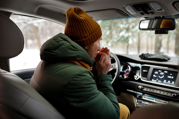 Medium shot man driving car