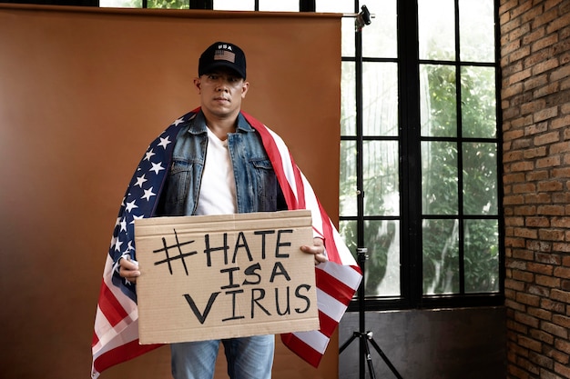 Medium shot man holding placard