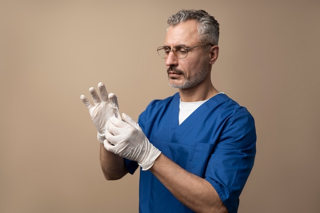 Free photo medium shot man holding vial