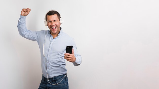 Medium shot of man listening to music