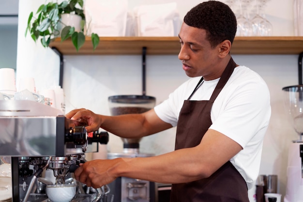 Medium shot man making coffee