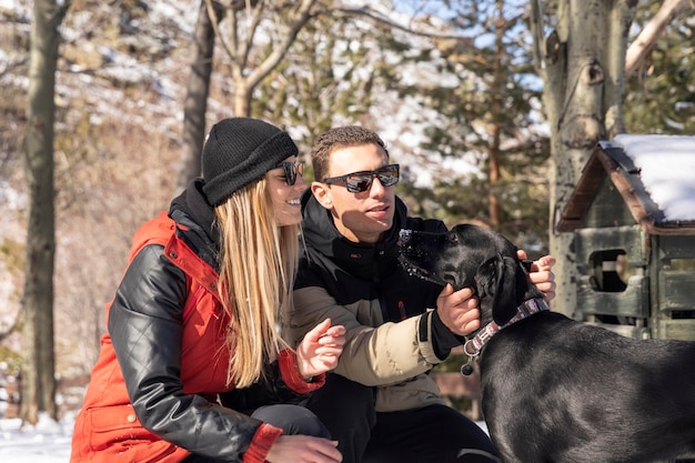 Free Photo medium shot man petting dog