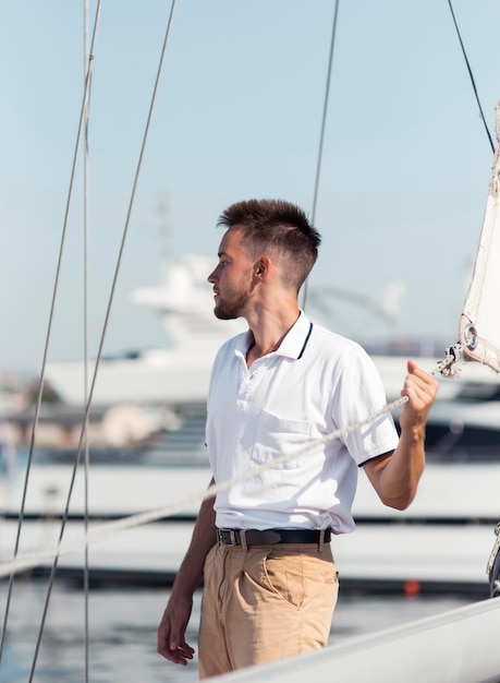 Free Photo medium shot man posing outdoors