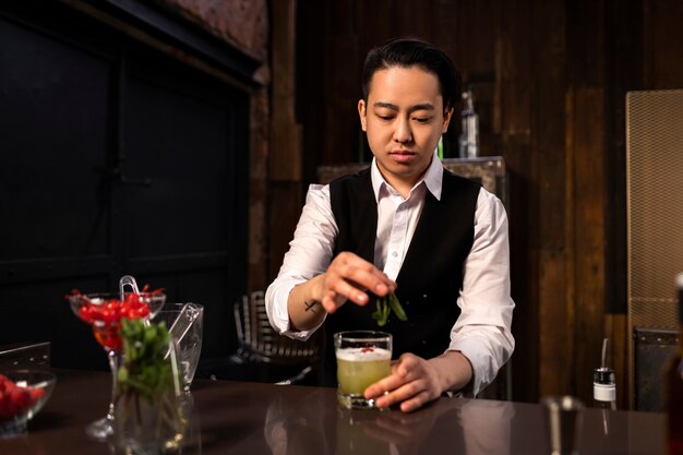 Medium shot man preparing drink