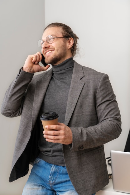 Medium shot man talking on phone