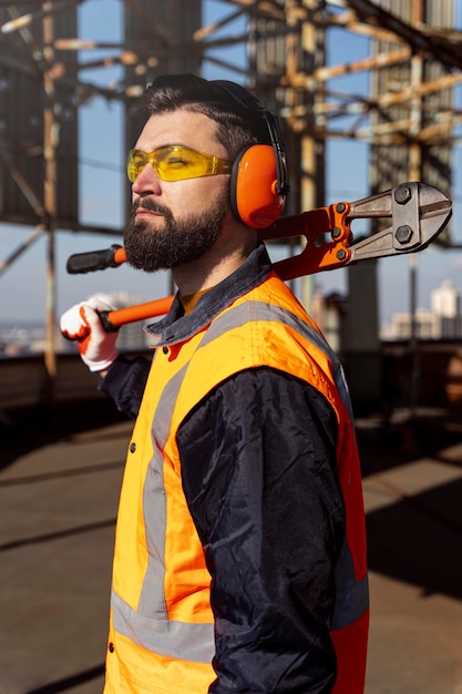 Free Photo medium shot man wearing safety equipment