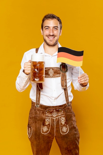 Medium shot of man with beer pint