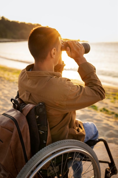 Medium shot man with binoculars