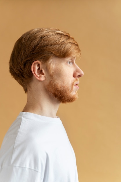 Medium shot man with freckles side view