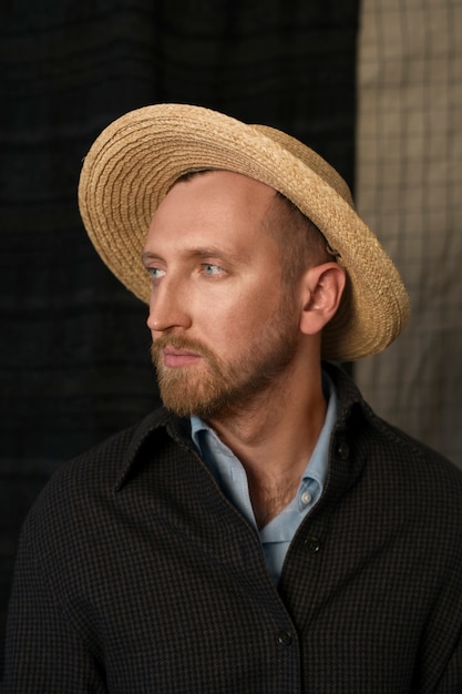 Medium shot man with hat portrait