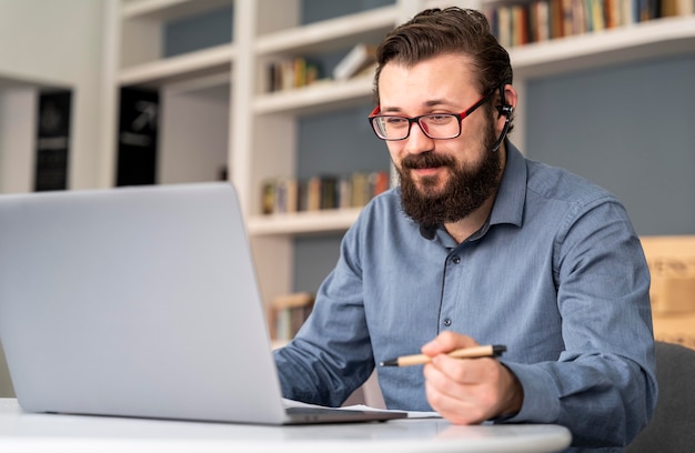 Medium shot man with laptop