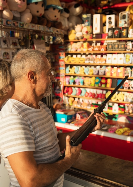 Free Photo medium shot man with rifle