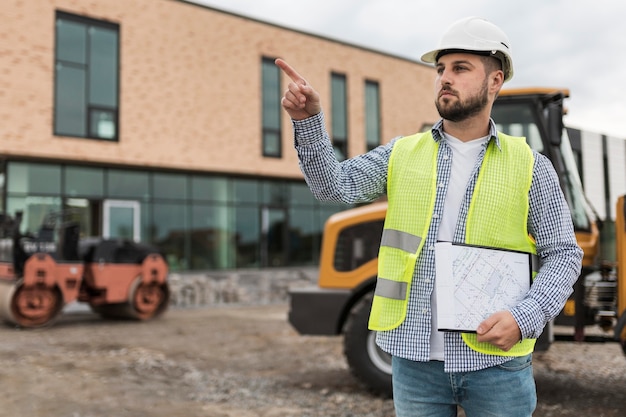 Medium shot man working on construction site