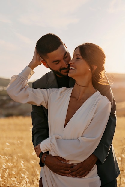 Free photo medium shot married couple posing together