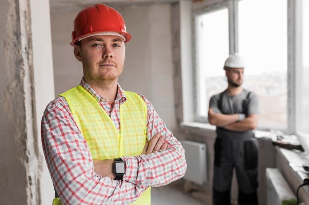 Medium shot men with crossed arms