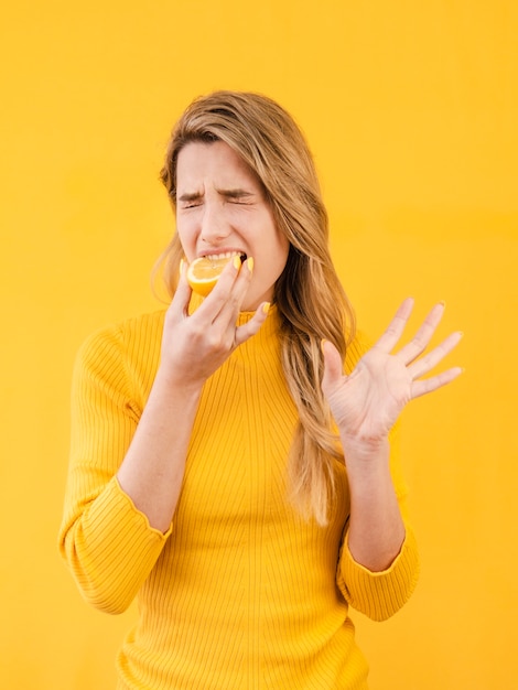 Medium shot model eating fruit