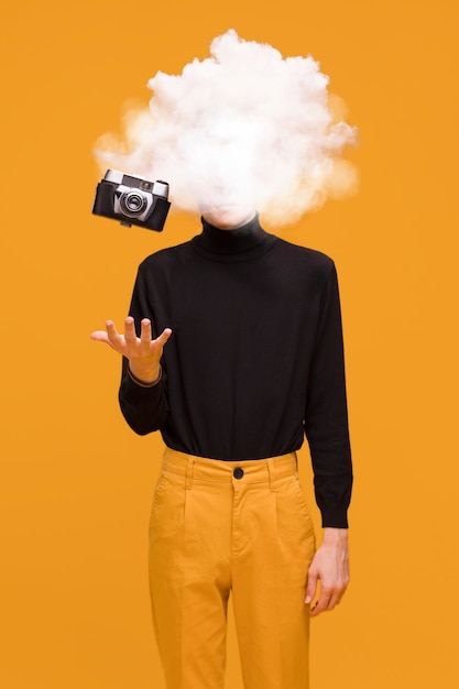 Medium shot model posing with cloud-shaped head